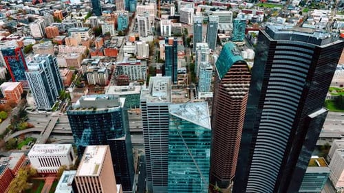 Cityscape of modern Seattle, Washington, US. Drone flying above the downtown of the metropolis