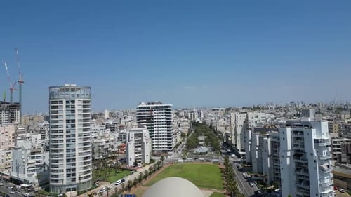 Aerial video of the city of Bat Yam. A drone flies over buildings