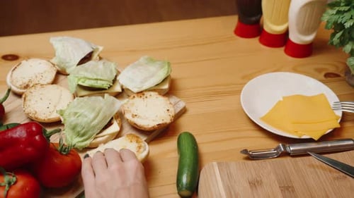 Food Preparation for Homemade Burgers on Wooden Table