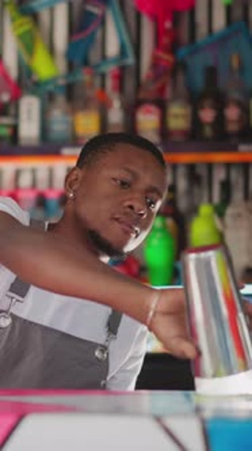 Barman Takes Shaker Dropping Glass
