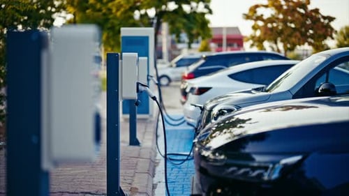 Electric cars recharging at the charging station. ev charging station. 4k