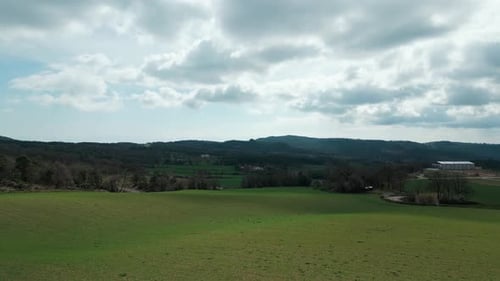 drone view of agricultural fields on the outskirts of the country - dolly in