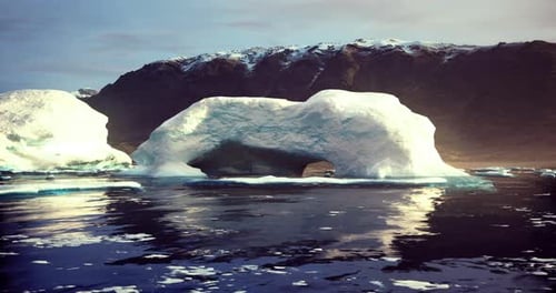 Realistic 3D Iceberg Floating Scene with Snowy Mountains
