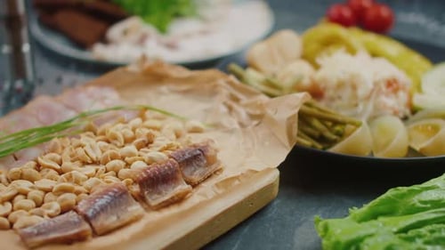 Various Meats and Vegetables on Table