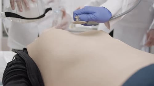 Medical Dummy Receives Breathing Assistance and Exam