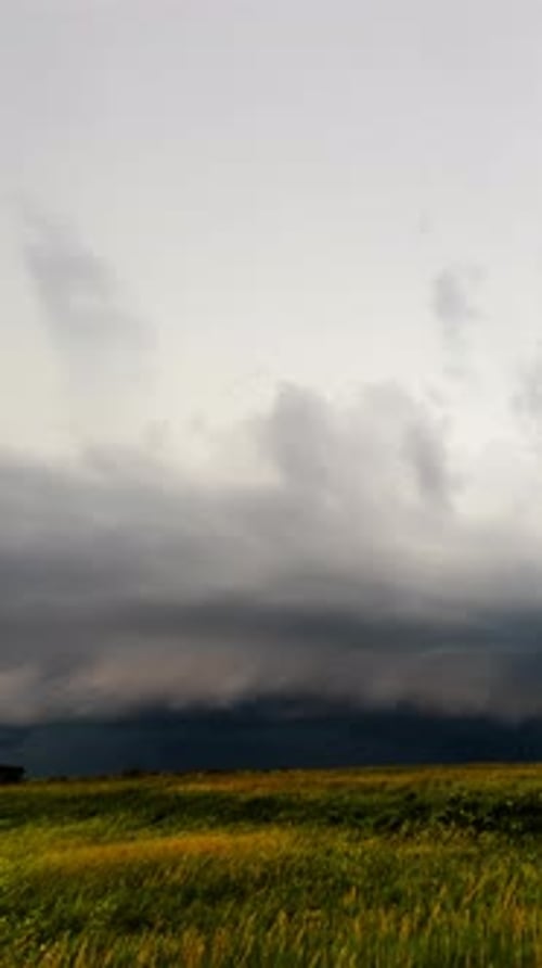 Storm Clouds Building Intensity Over Rural Natural Landscape With Dramatic Sky And Weather