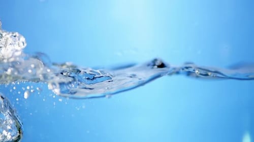 Fresh water bubbles rise from below, creating ripples and waves that symbolize cleanliness, purity,