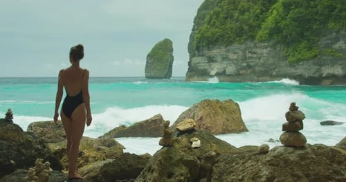 Woman Enjoying Tropical Beach and Turquoise Ocean View