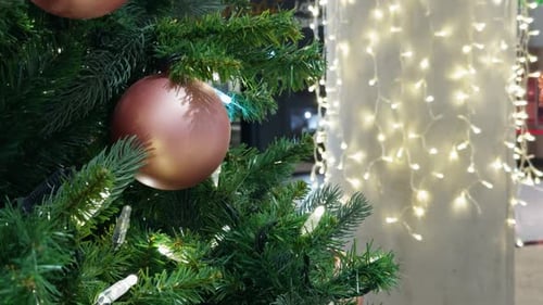 Festively Decorated Christmas Tree Adorned with Warm Lights and Ornaments Stunning Stock Footage