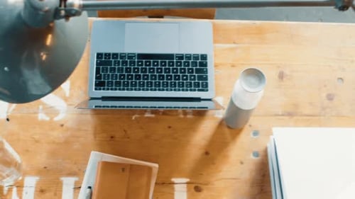 Modern Technology on a Rustic Wooden Desk