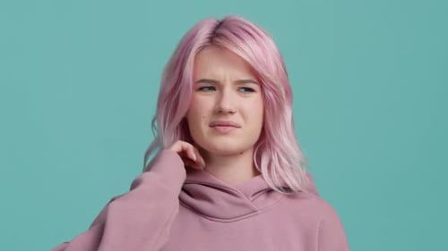 Teenager with Neck Pain Rubbing Sore Neck