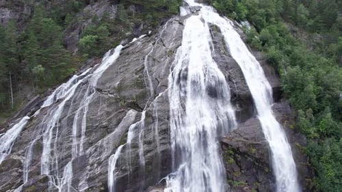 aerial view of norwegian mountains and waterfall