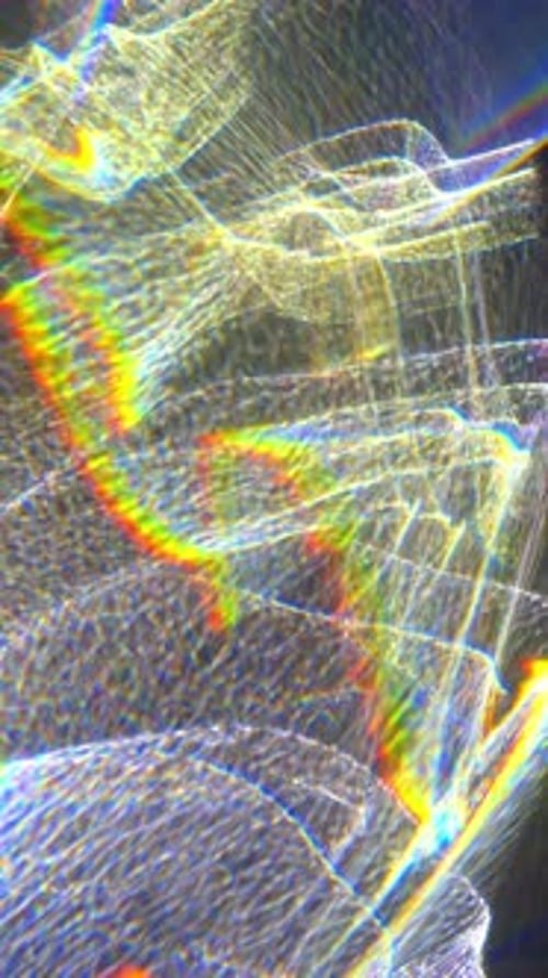 Dynamic Prismatic Light Waves Against Dark Backdrop