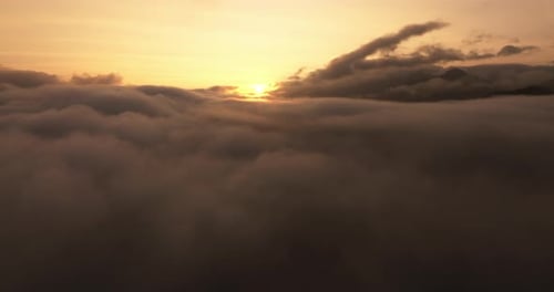 Sunset's Glow Over Clouds