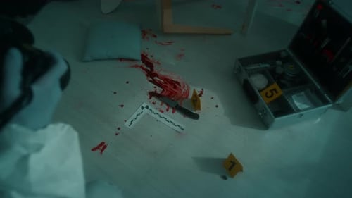 Crime Scene Investigation with Knife and Blood Spatter