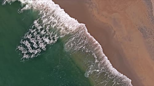 Surfing Waves Crashing Against Sandy Shore Crashing Waves on Sand Beach an Aerial View of Ocean