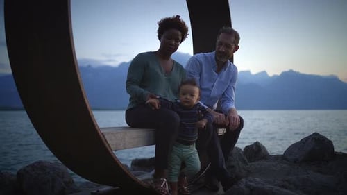 Family Bonding Moments During the Beautiful Sunset at the Lake Side Cherishing Memories