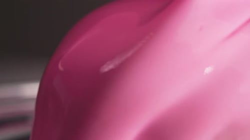 Pink Icing Glazing Over a Dessert Treat