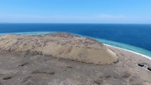 View The Hill on The Island with Blue Sea