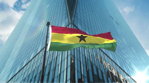 Waving Ghana Flag Animation with Modern Corporate Building