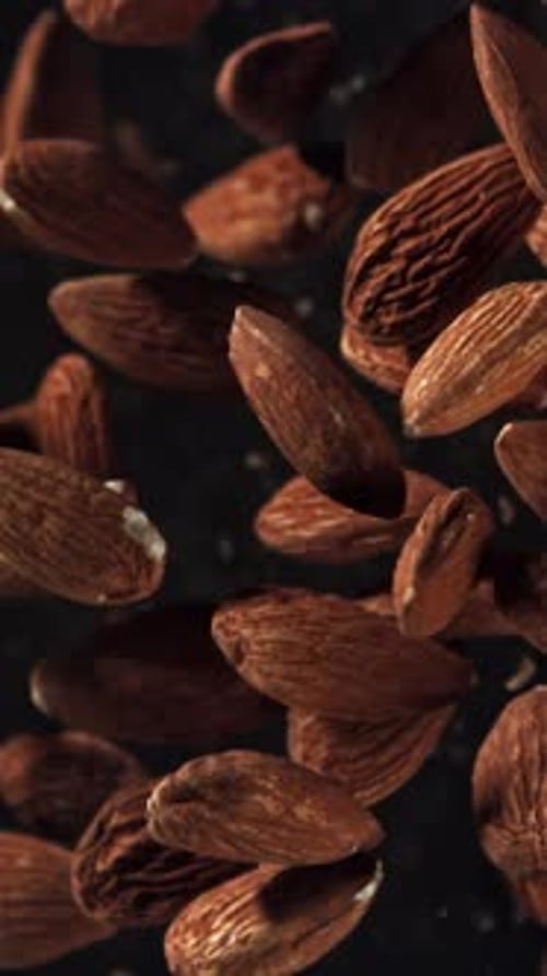 Almonds Fly Up and Fall Down Filmed on a Highspeed Camera at 1000 Fps