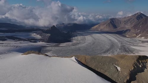 Aerial View Glacier Carves Through Mountains Earth's Masterpiece Glacier in Winter Landscape Haven