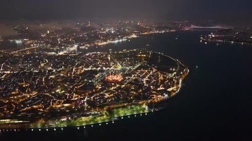 Night aerial view of Istanbul’s Sultanahmet district illuminated by city lights