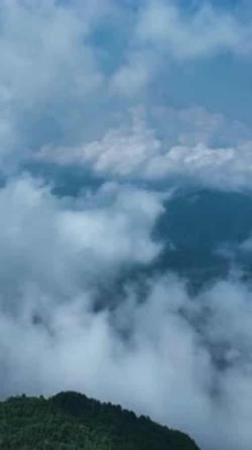 Vertical View Of Mountains Hills with Cloudy Sky