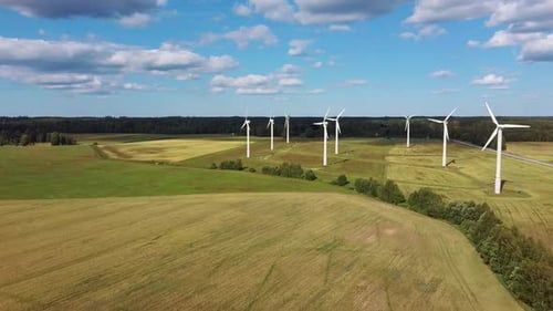 Aerial View of Wind Farm or Wind Park, With High Wind Turbines for Generation Electricity 4K UHD