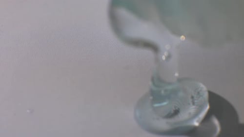Dispensing Clear Viscous Liquid onto Clean Surface
