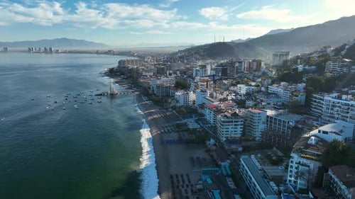 Playa De Los Muertos beach and pier close to famous Puerto Vallarta Malecon, the city largest public