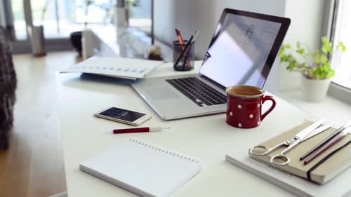 Home Office. Desk with Various Gadgets and Office Objects