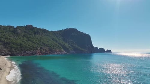 Aerial Video Bright White Sand Beach With Shallow Crystal Clear Water A Peaceful Ocean View With