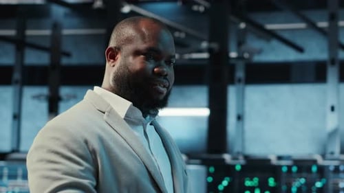 Data Center Engineer Adjusting Blade Server Hardware