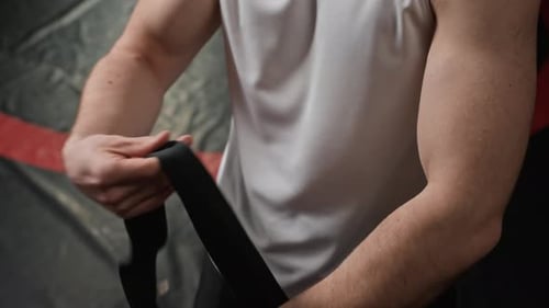 Boxer Wrapping Hands Before Training