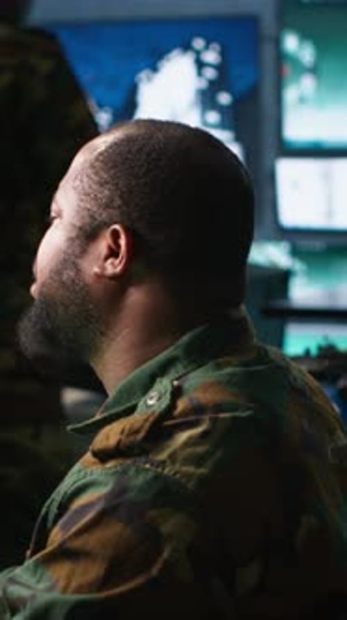 Vertical Video Soldier Doing Tasks in Military Base Using Radar Intercepting Rockets