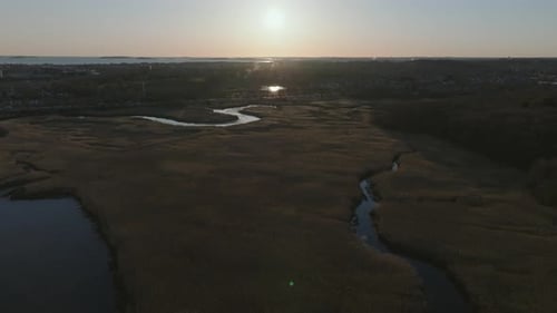 Aerial view of winding river through marsh, United States.