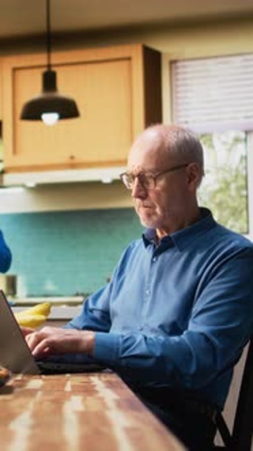 Vertical Video Unhappy Distressed Old Man Finds Bad Disappointing New on Laptop