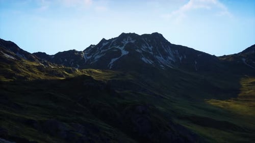 A Breathtaking Mountain Range Under a Clear Blue Sky
