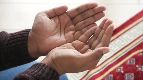 Muslim Man Keep Hand in Praying Gestures During Ramadan Close Up