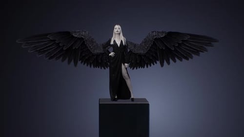 Ethereal Woman with Black Wings on Pedestal
