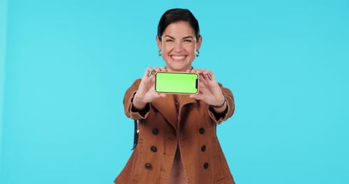 Green screen phone, presentation and happy woman show at mobile app mock up