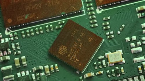 Motherboard from laptop computer components macro close up. PC chip, cpu, circuits