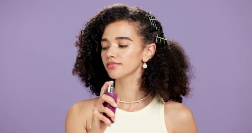 Woman, face and beauty with perfume in studio for fragrance, deodorant mist