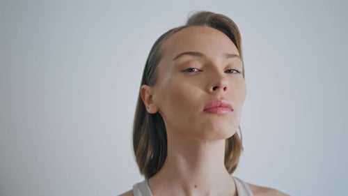 Woman Opens Eyes in a Beauty Portrait