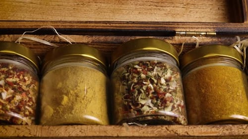 Spice Jars in Rustic Wooden Box, Dolly Shot