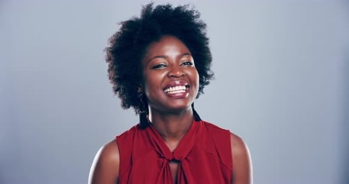 Smiling Woman Gives Thumbs Up Approval