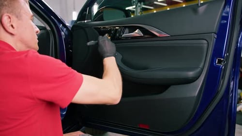 Detailing Car Interior Door with a Brush