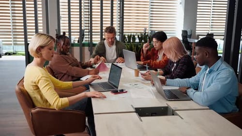 Office Day Diverse Multi Ethnic Group of Business People Analyzing Sales Growth in Office Interior