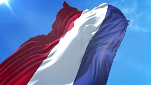 Realistic French Flag Waving Loop Against Blue Sky